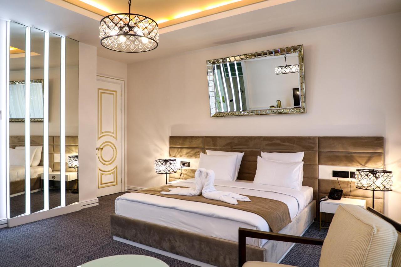 Aghababyan'S Hotel Jerevan Exteriér fotografie A bedroom at the hotel